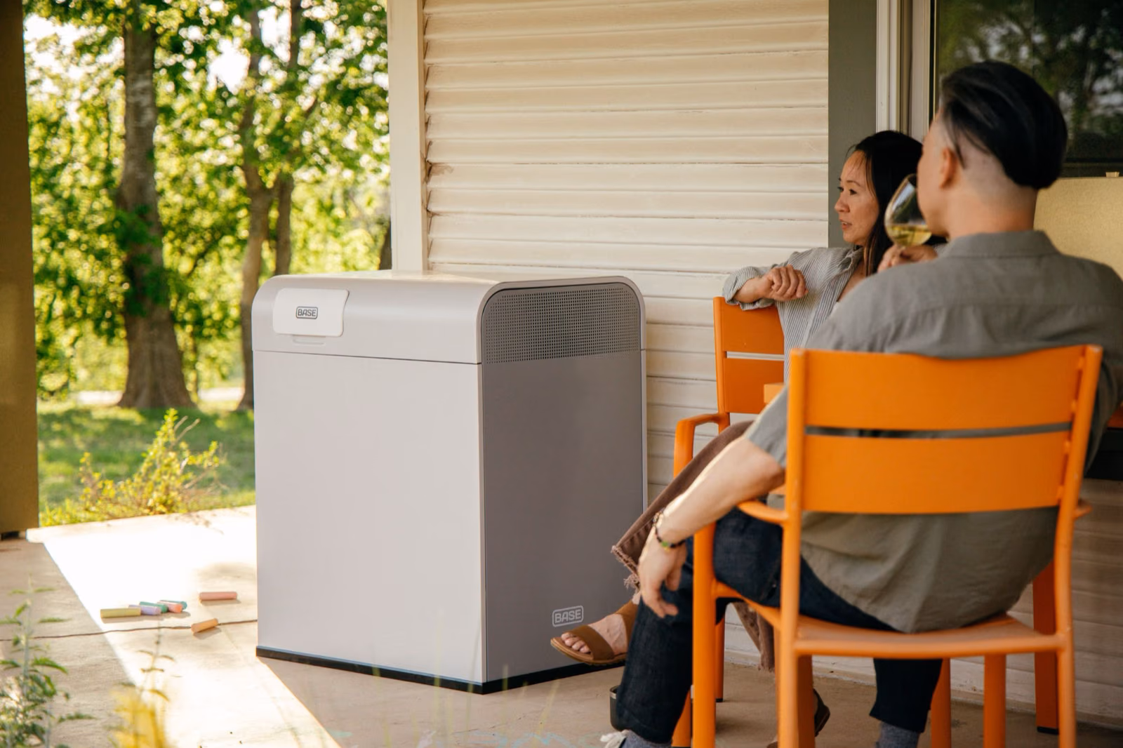 Base Core home battery installed on a covered porch